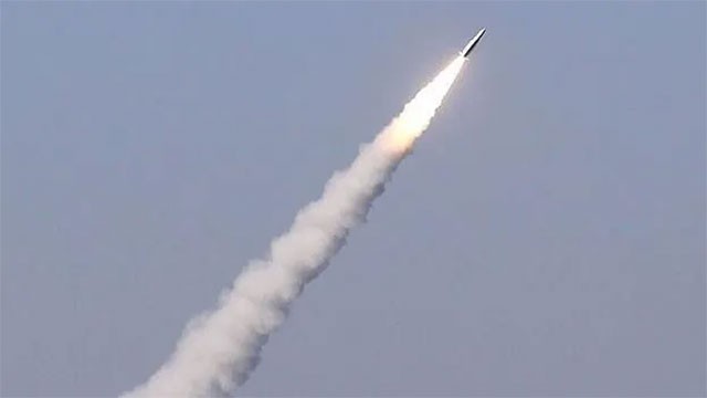 North Korea fires missile barrage hours after Trump says he will meet Kim