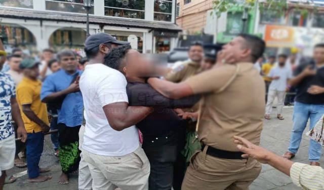 Man arrested for abusing police on duty at Kandy Esala Perahera