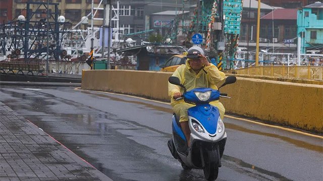 Southern Taiwan shuts offices and schools as torrential rain floods Kaohsiung