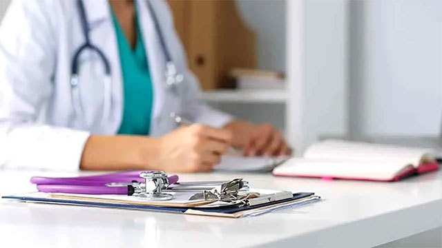 Six-member committee to study proposed intermediate grade for doctors, report in a month