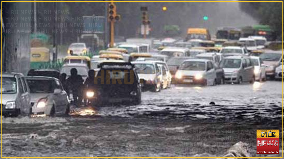 Colombo roads flooded and landslide warnings widen to seven districts as the rain arrives early