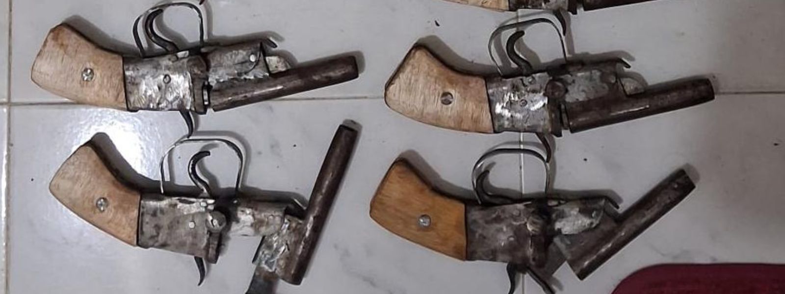Police seize 19 revolvers and arrest four in Dematagoda raid
